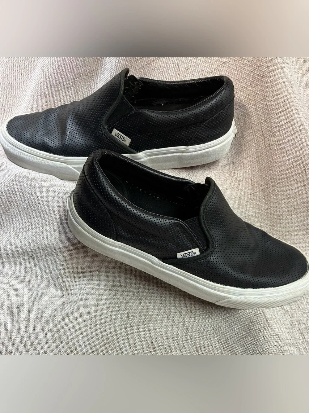 Vans Black Perforated Leather Slip-On Sneakers with White Sole
